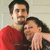 A pixelated image of two people embracing, with a green displaying purple text on the right side