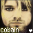 A 48x48 pixel animated contact sheet showing two side-by-side frames of a person's face with text "cobain" and star symbols below each frame.