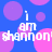 Blue background with pink and purple circles; white text 'i am shannon' repeated in pixelated font.
