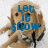 Pixelated image of a light brown dog with long fur, blue text overlay reading 'Let it snow', and visible pixelation artifacts.