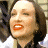 A 48x48 pixel buddy icon split into two sections: a left-side portrait of a person with brown hair and red lipstick, and a right-side green background with bright green text reading "Original Icons .com".