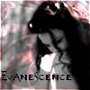 A grayscale image of a person with long dark hair holding a white object near their face, with the word 'EVANESCENCE' in block letters at the bottom.