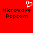 Red background with pixelated white heart symbol above black text reading "Microwave Popcorn" in two identical side-by-side arrangements.