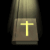A static icon shows a glowing yellow cross on a brown book beneath draped fabric, with no visible motion.