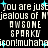 Pixelated text repeats 'you are just jealous of M' and 'AWGONE SPARKU' with cyan starbursts on black background, forming a wordwall.