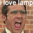 Static 48x48 pixel buddy icon featuring a close-up of a man's face with mouth open, overlaid text reading "i love lamp", and blurred background elements.