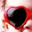 A four-quadrant image shows a person wearing red heart-shaped sunglasses with dark lenses, mouth open in an exaggerated expression, and text reading 'hey baby' on a red background.