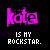 Pixelated pink text 'koe' above white pixelated text 'IS MY ROCKSTAR.' on a dark multicolored background.
