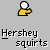 Animated sequence showing a yellow hand squeezing brown liquid from the palm, forming a growing puddle that eventually displays 'Hershey's' text on its surface.