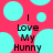 A static image with a bright pink background featuring large cyan circles and small cyan dots, displaying the text "I Love My Hunny" in black pixelated font.