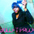 A person with blue hair wearing a black jacket and orange shirt, making a hand gesture with a light blue background and pink text at the bottom.