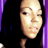 Pixelated static image of a person's face with purple side borders and black background, appearing as an AOL Instant Messenger buddy icon.