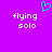 A static image with a solid purple background, white pixelated text reading 'flying solo' on both sides, and a cyan pixelated heart symbol above the text.
