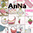 Pixelated image with 'Anna' text overlay and scattered pastel-colored objects including a pink flower, green plant, red fruit, and blue shape.