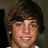 Pixelated portrait of a smiling person with brown hair, green text reading 'Mrs.', 'Ryan', and 'Sheckler' on white background.