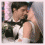 Animated sequence showing two figures in close physical contact, transitioning from a side embrace to a kiss.