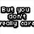 Black and white pixelated text fragments with a musical note symbol on a white background.