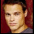 A 4-frame contact sheet of an animated AIM buddy icon featuring a celebrity photo and text elements with color variations across frames.