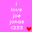 Pixelated pink background with white text reading 'i love joe jonas (333)' and red heart symbols in two positions, animated to alternate between heart presence and absence.