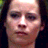 A split-frame contact sheet showing a pixelated close-up of a person's face on the left and green foliage with text on the right, both in low-resolution 48x48 pixels.