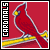 Static pixel art of a red bird with yellow accents perched on a branch against a solid red background, with vertical text reading "CARDINALS" in white letters on a black strip.