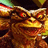 A pixelated close-up of a cartoonish creature with large red eyes, brown fur-like texture, and yellow accents on its face against dark background.