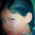 A pixelated close-up of a person with dark hair and blue eyes, wearing a light-colored top against a green background.