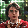 A character with brown hair and round glasses wears a red sweater over a light shirt against a green background, with text below