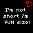 Black background with white pixelated text reading "I'm not short i'm FUN size!" and a red heart symbol above the text.