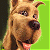 A pixelated cartoon dog face on a green background with green text reading "Original Icons .com" in a contact sheet layout showing two frames side-by-side.