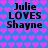 Blue background with pink heart pattern, two identical text blocks reading "Julie LOVES Shayne" in black pixelated font, repeated side-by-side.