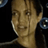 Static 48x48 pixel icon showing a close-up of a person's face with light brown hair and neutral expression against dark background, rendered in low-resolution pixel art style with visible dithering and color blending.