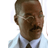 Static 48x48 pixel icon of a man with short dark hair, mustache, and light blue shirt with dark tie against white background.