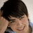 A pixelated image of a person with dark hair holding their head, set against a blue background with green text reading "Megan and Jen are gettin married to joe jonas !!!! lol good times jen!!!<3".