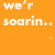 Orange background with repeated white text 'we're soarin..' and brown text variations including 'fly', 'flyi', 'flyin', 'flyin!', showing animation progression of text fragments.