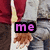 Two people in red and gray clothing sit side-by-side with hands clasped, overlaid with pink text reading "me" and "and him perfect?"