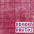 identical pixelated text icons on a textured pink background, each displaying 'BROKEN PHOTOS' with varying color schemes