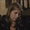 A static image shows two people in a room with a teal text box reading 'Carter and Abby' over the lower portion.