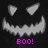 Pixelated jack-o'-lantern face with triangular eyes and jagged mouth, pink 'BOO!' text below on black background.