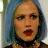 Four pixelated show a person with light blue hair and dark choker, each displaying distinct facial expressions and background variations