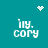Pixelated teal background with white text 'i1y. cory' in four quadrants, two white pixelated heart symbols, and two white pixelated starburst symbols.