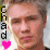 A pixelated image of a person with light hair and neutral expression, featuring vertical text on the left side.
