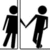 Two black stick figures holding hands across a vertical gray line on white background.