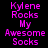 Pixelated text displays "Kylene Rocks My Awesome Socks" in pink on black, with alternating white background sections across three of repeated text