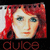 Pixelated image of a person with red hair and light skin, wearing dark clothing, with the text 'duke' below.