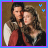Two people in historical clothing embrace against a brown background, with small blue and pink heart symbols appearing near the top corners.
