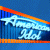 Pixelated icon with blue background, orange diagonal stripe, and white stylized text reading 'Aim' over dark vertical bars.