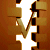 Brown and gold pixelated V-shaped symbols arranged in a repeating pattern on a white background