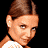 A 2x2 contact sheet of four pixelated frames showing a woman with brown hair in different poses and expressions, alongside text reading "Coolbuddy.com" on the right side.