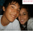 Two people in a close pose on the left, bright cyan background with pink pixelated text reading KIKI IS MY BFF!! <33 on the right.